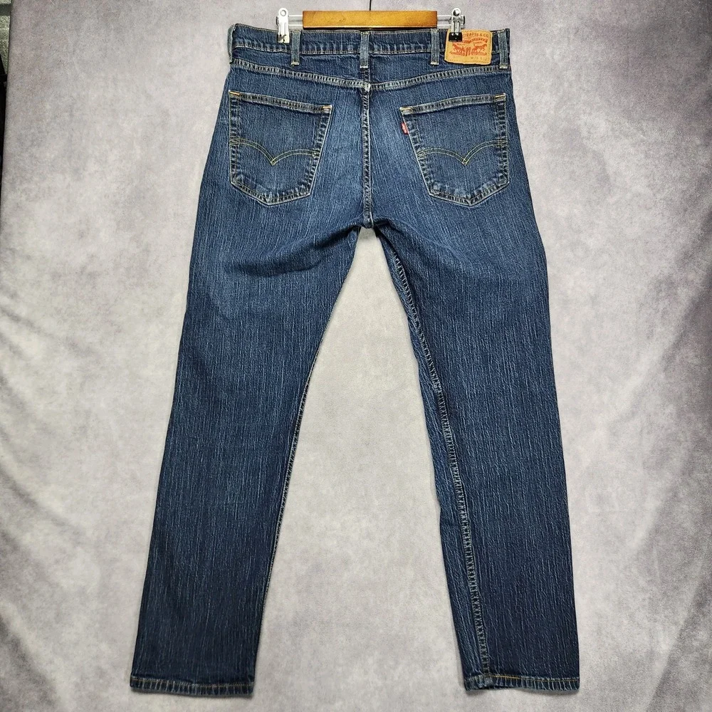 Levis 502 Regular Taper Mens Jeans size 36 38x32 Dark Wash Blue Stretch - Picture 1 of 16